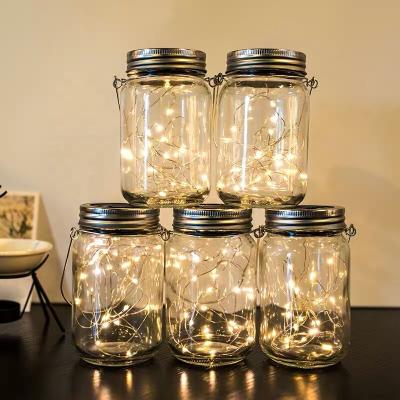 China Clear Led Solar Outdoor Waterproof Glass Pendant Mason Jar Lights Solar Bottle Light Lights Outdoor for sale