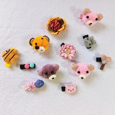 China Children's hair clips Customized popular cartoon Chinese style mixed hair clips for children's plushhair clips for sale