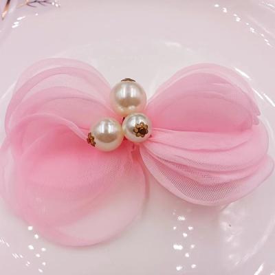 China Babies wear flowers on their heads Chinese manufacturers custom processing organza pink bow accessories for sale