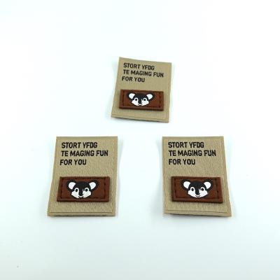 China Handmade Koala Printed Leather Patches Sew On Garment Labels Woven Labels For Clothes Hat for sale