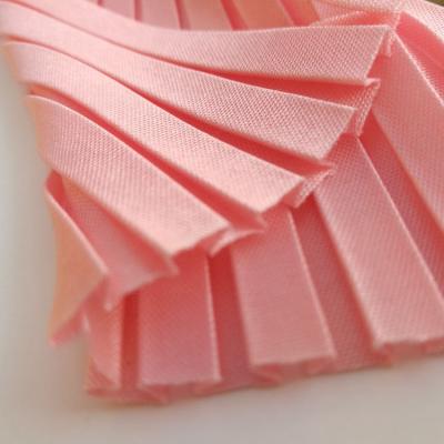 China Hot Selling Pink Color Anti-Static 100%Polyester Knit Pleated Fabric For Dress for sale