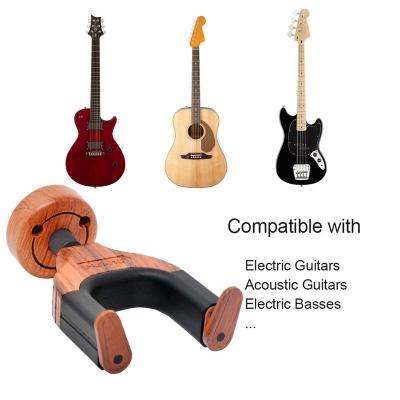 China GUITAR wholesales hot detachable style wooden guitar hanger water transfer wooden copy split style self-locking guitar wall hanger for sale