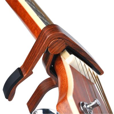 China Portable wholesale prices exclusive use aluminum alloy capo Profession JX-09 high quality acoustic guitar capo for sale