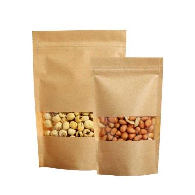 China Factory wholesale food packaging doypack moisture proof stand up pouch plain brown kraft paper bag with clear window and zip lock for tea snack for sale