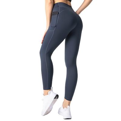 China Breathable Women High Waisted Gym Tights Pockets Yoga Gaiters Workout Butter Soft Pants for sale