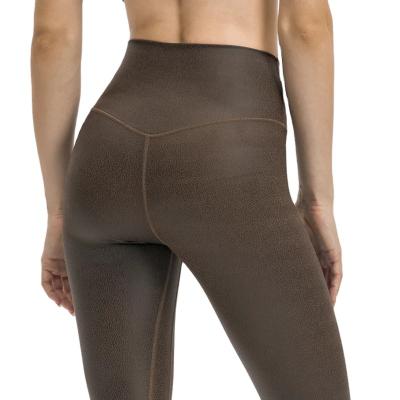 China Breathable Brushed Yoga Pants Women Faux Leather Workout Gaiters With Hidden Pocket for sale