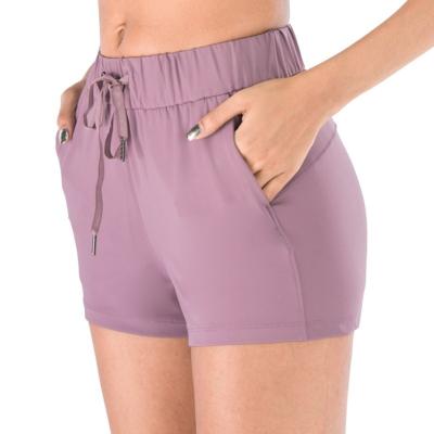 China Anti-Wrinkle High Waist Lift Up Sports Cycling Gaiters Phone Pockets For Woman Running Fitness Shorts for sale