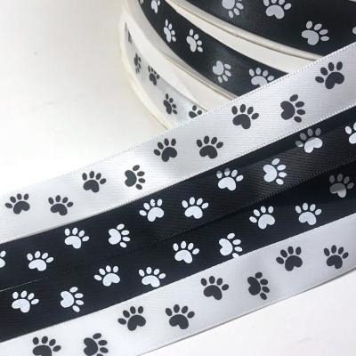 China Single Face Wholesale Custom16mm Dog Paw Satin Ribbon With Logo for sale