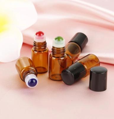 China Portable 2ml Essential Oil Rollerball Container Travel Skin Care Set Glass Bottle Cosmetic Brown Refillable Roller Bottles for sale