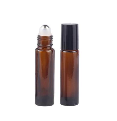 China Cosmetic Amber Glass Roll On Bottle Metal Ball Roll Essential Oil Slim Glass Vials for sale