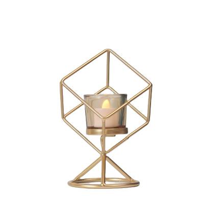 China Romantic home decoration groceries gold house metal open candle holder ornaments for wedding living room for sale