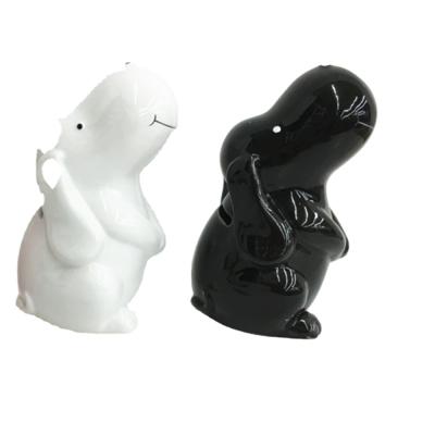 China High Quality Handmade Ceramic Simple White And Black Dog Piggy Bank Cartoon Piggy Bank Cash Money Bank for sale