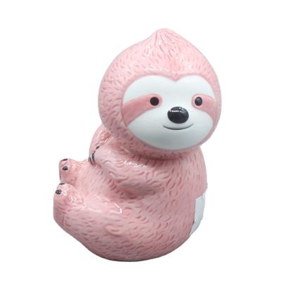 China Home Decor Handcrafted Piggy Bank Customized 3D Pink Ceramic Animal Money Piggy Bank Sloth Piggy Bank for sale