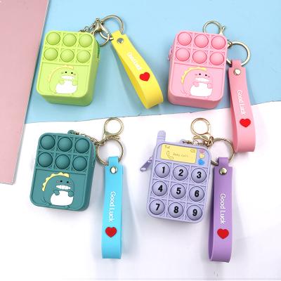 China Waterproof Restless Sensory Stress Reliever For Finger Press Bubble Bag Purse Bag Kids Silicone Cartoon Dinosaur Mini Key Chain Pendant Keyr for sale