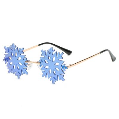 China Fashion Sunglasses 2021 New Retro Personality Fashion Funny Snowflake Dancing Rimless Sunglasses for sale