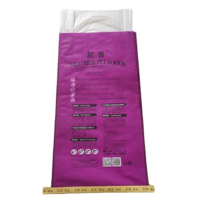 China Customized Wholesale Waterproof And Moisture Proof 20kg Bopp Adult Film Animal Dog Food Packaging Feed Bags for sale