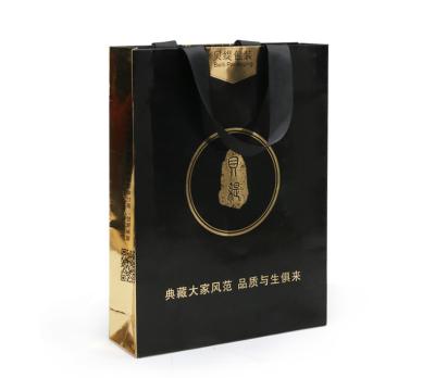 China Recyclable Custom Logo Gift Paper Bag Kraft Paper Packaging Bag Custom Color Print for sale