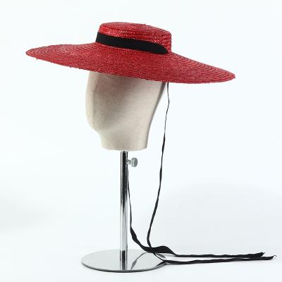 China Big brim metal hole striped bottom flat surface hat lace up photo shoot female beach straw hat female hat for sale