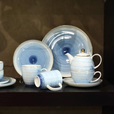 China Restaurant Sustainable Dinnerware Unique Design 16 Piece Handmade Porcelain Dinner Set With Gold Line for sale