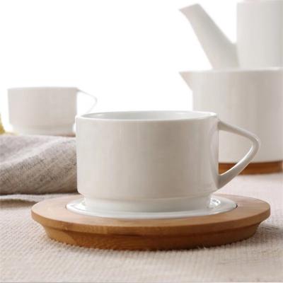 China Viable Custom Logo Wood Cappuccino Cafe Decor White Porcelain Tea Cup And Saucer for sale