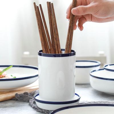 China Cheap Ceramic Chopsticks Holder Sustainable Items New Design With Blue Rim for sale