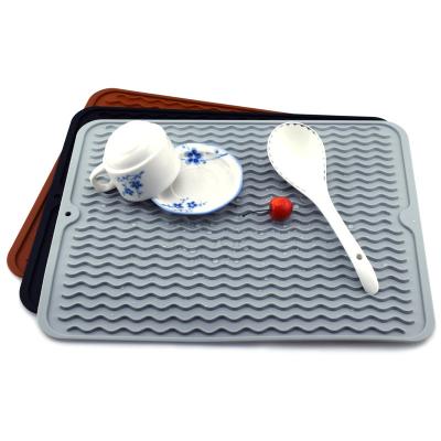 China Stocked High Quantity Dishes Drain Home Area Mat Kitchen Slip Silicone Anti Drying Mats for sale