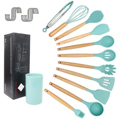 China 11pcs Silicone Stocked Heat Resistant Cookware Set Wooden Spatulas Turner Tongs Whisk Kitchen Appliances Handle Spoon Shovel for sale