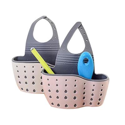 China Adjustable Kitchen Accessories Sink Rack Bathroom Sponge Soap Shelf Drain Holder Silicone Storage Basket Bag Eco-Friendly Faucet Holder for sale