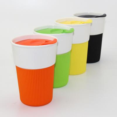 China Travel Sustainable Ceramic Mug Ceramic Cup Mug With Silicone Sleeve for sale