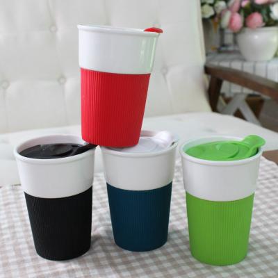 China Viable Wholesale New Design Ceramic Coffee Mug Ceramic Mug With Silicone Sleeve for sale