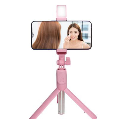 China New ABS+Stainless Control Mini Selfie Stick 360 Rotation Steel Wireless Smart Tripod Flexible Ring Light Selfie Stick With Fill Light for sale