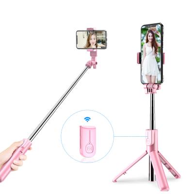 China Fold Mini Wireless Bluetooth Flexible Selfie Stick Foldable Phone Built-in Selfie Stick 360 Rotation Selfie Stick for sale