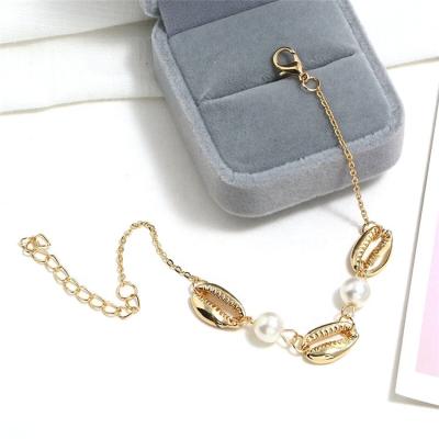 China Trendy Gold Sea Shell Bangle Chain Jewelry Gift Cowrie Shell Bracelet Summer Bohemia Stainless Steel Sea Weave For Women for sale