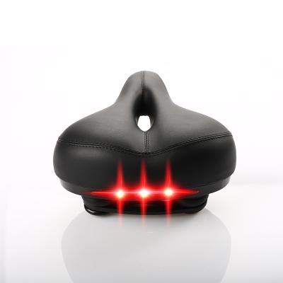 China With Light Bicycle Seat Tail Light Widen MTB Cushion Road Bike Seat Spare Parts Soft Comfortable Carbon Saddle With 3led Alarm Light for sale