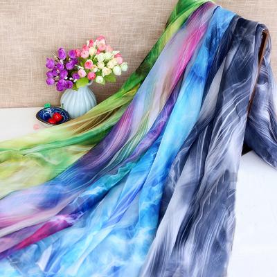 China Anti-static Polyester 30D Silky Soft 100% Transparent Ink Dispersion Printed Chiffon Fabric For Summer Dress Scarf for sale