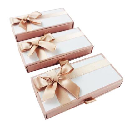 China Customized Wholesale Natural 3D Drawer Lash Case Bowknot Ribbon Lash Nude Case Custom Mink Eyelashes Gift Eyelash Box With Highlights for sale