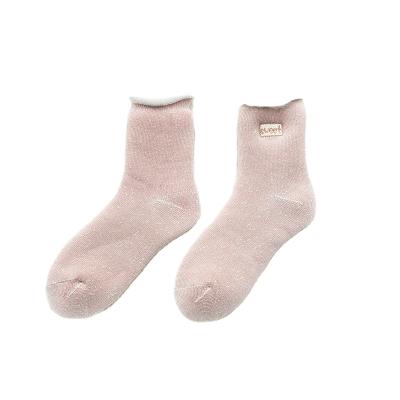 China Latest China Dropshipping Women's New Pattern QUICK DRY Women's Colorful Snow Socks Round Pattern Woolen Snow Socks for sale