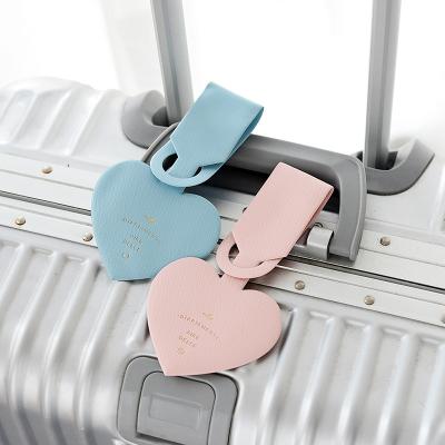 China Simple Heart Shape PU Leather Luggage Tag Women Travel Suitcase ID Address Holder Girls Luggage Tags Portable Boarding Bag Label for sale