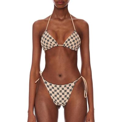 China 2022 New Fashion Women's Breathable Swimsuit Woven Rope Printed Bandage Adjustable Sexy New Women's Bikini Slit Multicolor Swimwear 09 for sale