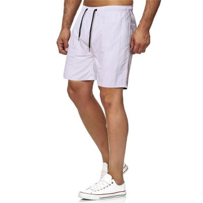 China Custom Logo Print Embroidered Men's Sports QUICK DRY Running Jogging Blank Panel Fitness Beach Shorts Solid Color for sale