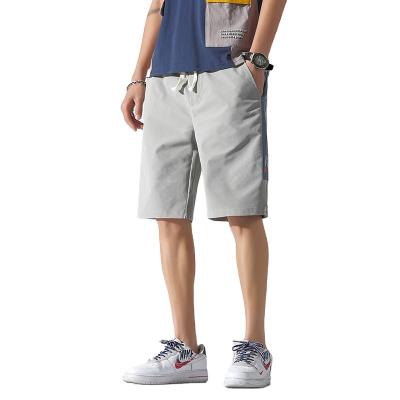 China New QUICK DRY Custom Drawstring Loose Casual Pants Solid Color Embroidered Summer Casual Men's Sports Gym Polyester Shorts for sale