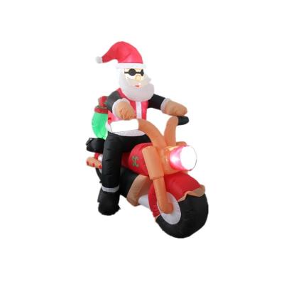 China Polyester Inflatable Christmas Santa On Motorcycle For Yard Decoration for sale