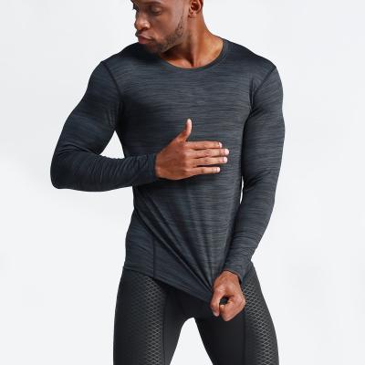 China Breathable Compression Training Long Sleeve Basketball Fitness Suit Men's Tight Sportswear for sale