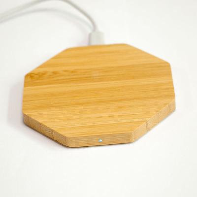 China 5W QI Wireless Charging Eco bamboo wood thin mobile phone universal wireless charging fast portable smart wireless charger for sale