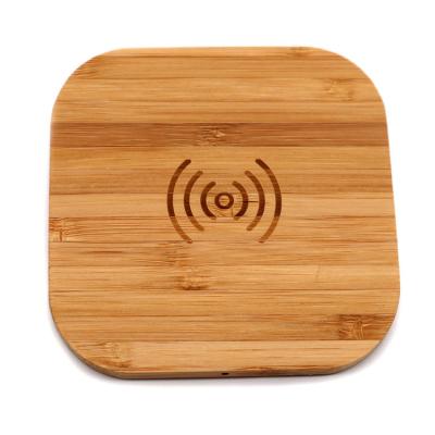 China Charge Eco-friendly Wholesale Custom Logo 5w 10W Portable Mobile phone station Fast Charging Qi pad Wood Bamboo Wireless charger for sale