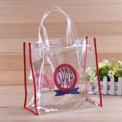 China Customized Logo Handled Printed Plastic Clear Packaging PVC Bags Transparent Shopping Gift Bag for sale