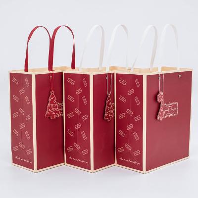 China Papel Firm Bag Bolsa De Regalo De Navidad Bolsas De Papel Tote Bag Saco De Packing Christmas Gift From China Supplier for sale