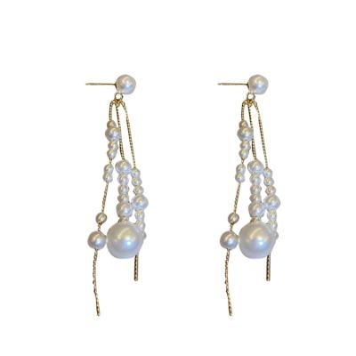 China Charming Hot Sale Elegant Long Dangling Tassel Pearl Earrings For Women Pearl And Gold Channel Stud Earrings Jewelry for sale