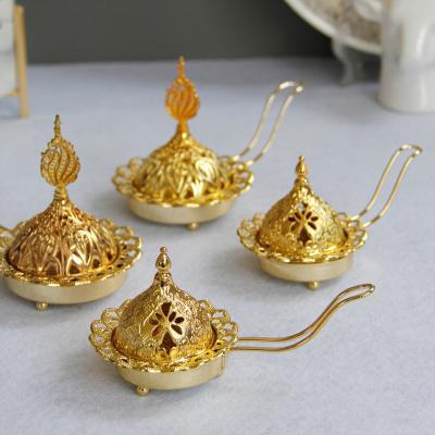 China Simple and modern home decoration gold metal censer Arabic Middle East style hand held censer candle holder dual-use for sale