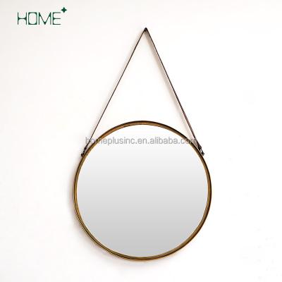 China Classic Classic Style Art Decor Gold Metal Wall Mounted Round Mirror Movable Wall Hanging Mirror With Leather Strap for sale